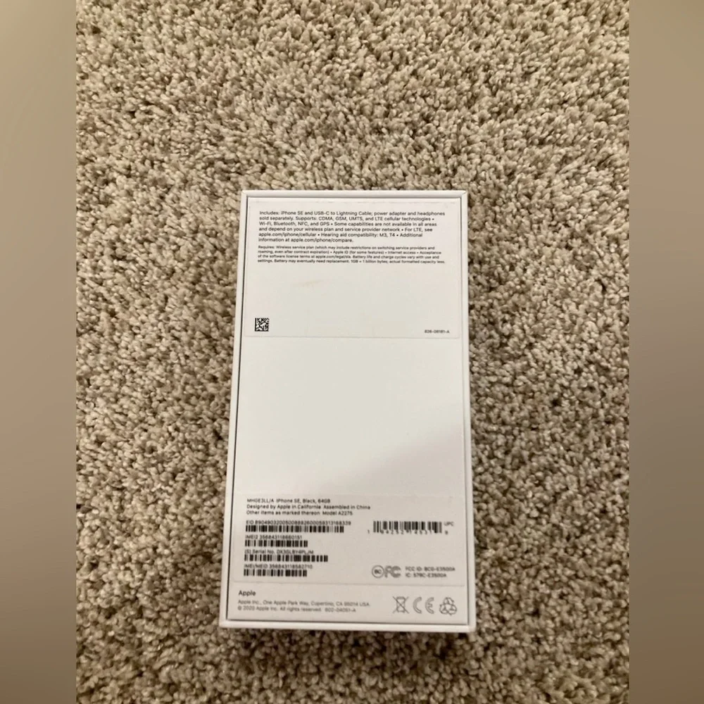 Apple iPhone SE black 64GB product box and instructions